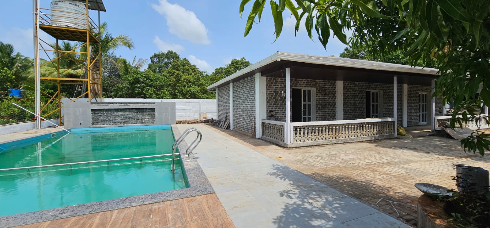 Villa exterior with poolside terrace